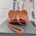 Brown litchi leather elephant-shaped mini coin purse with wrist strap and zipper - Caramel color