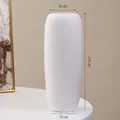 Minimalist matte white ceramic vase in capsule shape, 24cm tall for modern home decor - Wanbai (24cm)
