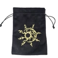 Close-up of black velvet drawstring pouch with golden sun totem print for tarot cards - Flame Song/Black