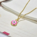 Detail of pink Evil Eye pendant with gold plating on a textured white surface - Necklace Set-Pink