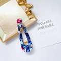 Teardrop acetate hair clip featuring deep blue and white marble patterns on a gold frame - Teardrop-Blue White Mixed Marble
