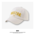 Detail of white cotton baseball cap featuring bold yellow 3D embroidery BOSTON 1630 - Off White