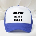 Detailed shot of the MILFIN' AIN'T EASY slogan printed on a blue and white trucker hat - Royal Blue