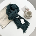 Deep green cashmere-feel scarf featuring soft fringe and elegant branding tag - Deep Sea Blue
