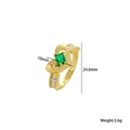 Goldener Herzring mit grünem rechteckigem Edelstein und funkelnden Zirkoniasteinen - Gold