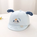 Detail van lichtblauwe baby pet met 3D hondenoren en schattig happy borduurwerk - 44cm 3-12 Maanden / Blauw