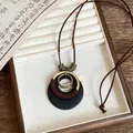 Sautoir bohème rétro avec perles en bois, cordon marron et pendentif anneaux laiton - Style Double Anneau Enveloppé Café