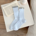 Light blue crew socks with grey ribbed cuffs and a cute cartoon label accent - One Size / Blue With Grey Cuff