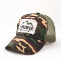 Detailed view of camouflage trucker hat featuring Explorer embroidery and distressed brim - Adjustable / Camouflage