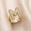 Gold plated ring with pave-set zirconia stones in the shape of letter M - Small / Letter M