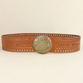 Close-up of a wide brown leather boho belt featuring metal eyelets and a brass buckle - 731 Style / Camel