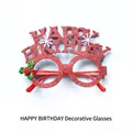 Sparkly red Happy Birthday party glasses featuring festive snowflake and holly leaf decorations - Red Happy Birthday Glasses