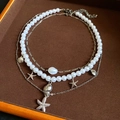 Three-layer silver shell and starfish necklace with white baroque imitation pearls - Silver Conch Starfish Pearl Shell Layered Necklace 3-Piece Set