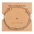 Detail of gold Morse code double-layer bracelet with rhinestones on BFF gift card - BFF Gold