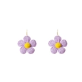 Detail of handmade raffia flower earrings in purple and yellow woven texture - Purple