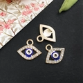 Three-piece gold-tone evil eye pendants featuring blue enamel and sparkling rhinestones - KC Gold Evil Eye 14x16mm