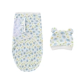 Detail of newborn swaddle and hat set with blue elephant and leaf patterns in soft cotton - Blue Bee Elephant Swaddle + Hat Set