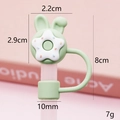 Green bunny silicone straw cover for 10mm Stanley cup featuring a colorful donut design - Green Rabbit Ear Donut
