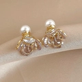 Detailed shot of gold-plated badminton earrings with crystal petals and pearl on satin - Gold Badminton Style (HE8328) / Gold