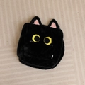 Detail of cute black plush cat bag with large yellow eyes and soft faux fur texture - 20cm No Filling No Zipper / Black Cat Skin