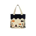 Detail of knitted tote bag with ocean pattern featuring fish and octopus designs - Beige