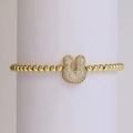 Elastic gold bead bracelet with a sparkling zircon encrusted U-shaped charm pendant - Letter U