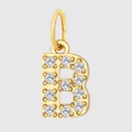 Detailed close-up of a gold-plated letter B pendant with sparkling inlaid zircon stones - Letter B