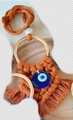 Brown and navy braided evil eye wall hanging with cotton tassel and metal ring - Red Ring Style