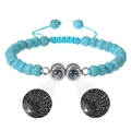 Detailed view of blue stone beads with a double nano projection stone showing I Love You - Turquoise