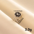 Detailed view of silver crescent moon ring showing 1.3cm face and 1.7cm adjustable band - Stainless Steel-Black Enamel / Silver-Black Moon