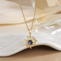 Close-up of gold-plated sun and moon necklace with dark blue opal and micro-set zircon - Dark Blue Gem Sun Moon (XL0303D)