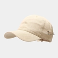 Detail of cream cotton baseball cap featuring silver safety pin decorative accents - Beige