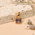 18K gold plated square necklace pendant with a purple zircon gemstone on beige stone - June/Purple