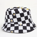 Detail of checkered bucket hat with daisy print showing cotton canvas texture - One Size (58cm) / Black Checkerboard Daisy