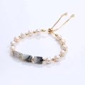 Elegant pearl and rectangular semi-precious stone bracelet with adjustable gold slider clasp - Black Rutilated Quartz