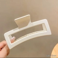 Matte cream-colored 13cm square hair claw clip for thick hair shown in hand - 13cm Rectangular - Cream White / Bulk (No Packaging)