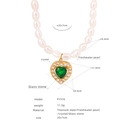 Collana di perle barocche con ciondolo a cuore dorato, pietra verde e cristalli lucidi - Collana Perla Pendente Cuore (P1516)