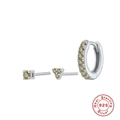 Macro view of S925 sterling silver three-piece earring set with yellow zircon accents - Silver-Olive Green Zirconia
