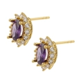 Detail of gold-plated stud earrings featuring purple marquise-cut zircon and white side stones - Gold Purple Zirconia