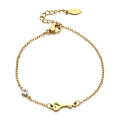 Close-up of a gold stainless steel bracelet featuring a heart key charm and a clear zircon - Heart Key Style (XN431-6)