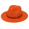 Detailed close-up of orange straw panama hat featuring brown leather band with gold buckle - Orange