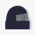 Gorro de punto acanalado azul marino y gris con forro polar y detalles de jacquard - Azul marino