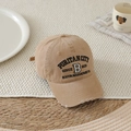 Macro detail of embroidered letter B and distressed brim on washed khaki cotton baseball cap - 52-54cm (3-8 Years) / Khaki