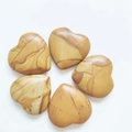 Set of five polished 2cm heart-shaped yellow jasper stones with natural texture - Wood Grain