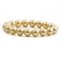 Bracciale minimalista con perle di conchiglia oro champagne con lucentezza metallica - Giallo