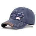 Detail of blue washed denim baseball cap with Los Angeles embroidery and leather trim - Adjustable / Blue