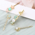 Set de horquillas de estrella de mar y concha con perlas y strass sobre tela verde - Juego de Estrella de Mar Perla y Concha Azul