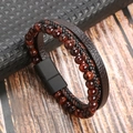Dettaglio del bracciale in pelle intrecciata con pietre naturali e fibbia magnetica - 21cm / Caffè+Occhio di Tigre Rosso