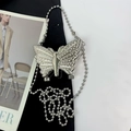 Elegant silver butterfly clutch with sparkling rhinestones and metal bead chain strap - Silver