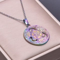 Macro view of a colorful rainbow-plated Celtic knot pendant in a pink velvet jewelry box - Rainbow Color Necklace With Pendant